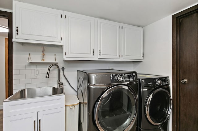 1083 Groton Ct, Schaumburg, IL 60193 - laundry room featuring washer and clothes dryer and cabinet space