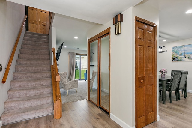 1083 Groton Ct, Schaumburg, IL 60193 - stairs with wood finished floors, baseboards, and recessed lighting
