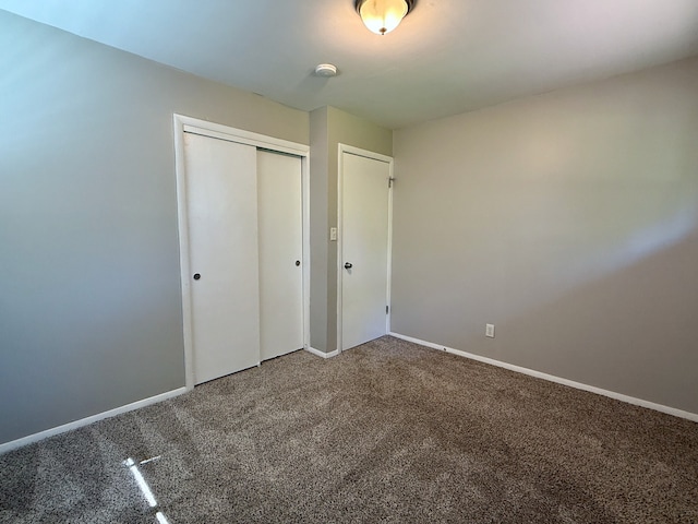 15503 Park Ln, South Holland, IL 60473 - unfurnished bedroom with carpet floors, a closet, and baseboards