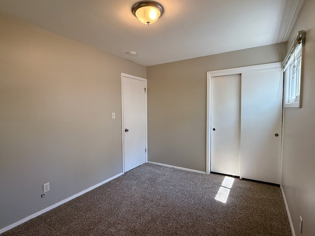 15503 Park Ln, South Holland, IL 60473 - unfurnished bedroom with carpet, baseboards, and a closet