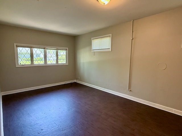15503 Park Ln, South Holland, IL 60473 - empty room featuring baseboards and dark wood-style flooring