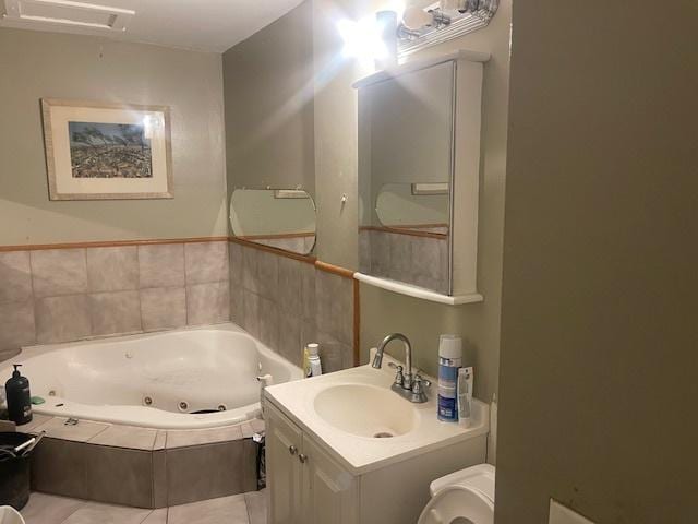 1713 W Thome Ave, Chicago, IL 60660 - full bath with a tub with jets, vanity, and tile patterned floors