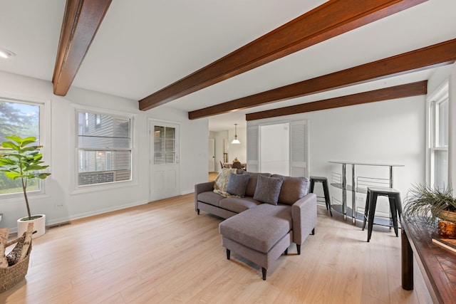 2S644 Devonshire Ln, Glen Ellyn, IL 60137 - living area featuring beamed ceiling, light wood finished floors, and baseboards