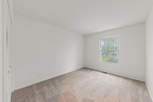 2S644 Devonshire Ln, Glen Ellyn, IL 60137 - empty room with carpet and baseboards