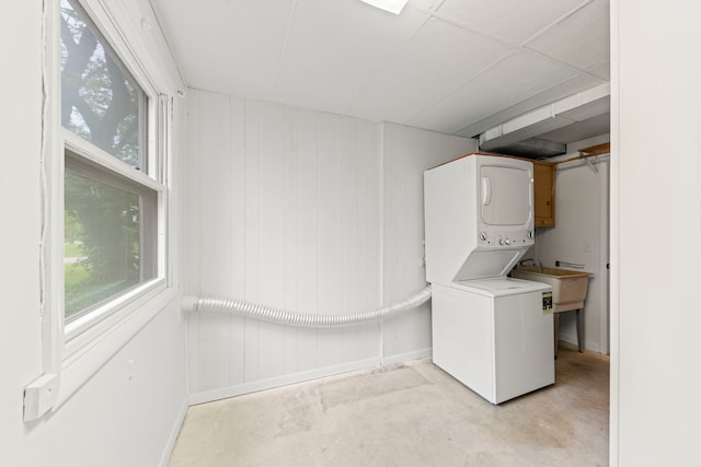 2S644 Devonshire Ln, Glen Ellyn, IL 60137 - washroom featuring stacked washer / dryer and baseboards