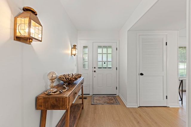 2S644 Devonshire Ln, Glen Ellyn, IL 60137 - entrance foyer with light wood-style flooring, healthy amount of natural light, and baseboards