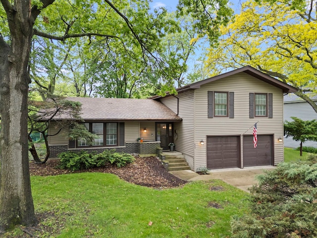 2S644 Devonshire Ln, Glen Ellyn, IL 60137 - tri-level home with a garage, driveway, a front yard, and brick siding