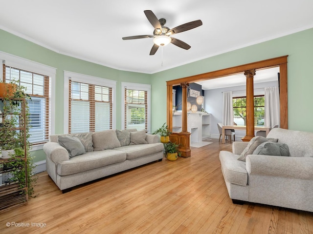 11 S Catherine Ave, La Grange, IL 60525 - living room with wood-type flooring, crown molding, a ceiling fan, and ornate columns