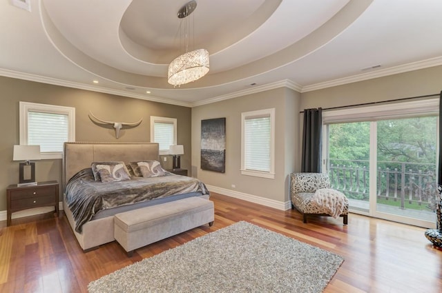 22W305 Broker Rd, Medinah, IL 60157 - bedroom with access to outside, wood finished floors, baseboards, a tray ceiling, and ornamental molding