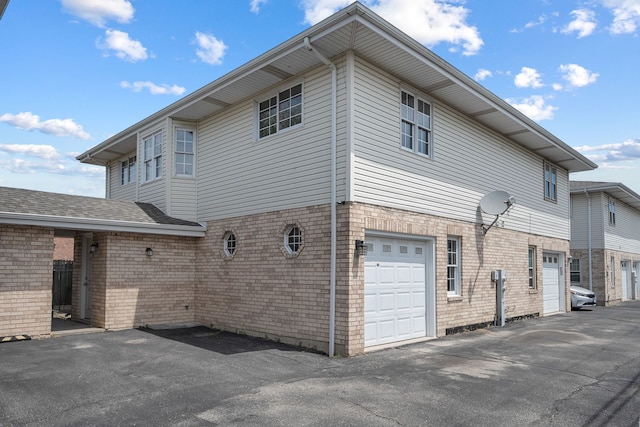 5343 S Long Ave Unit 5, Chicago, IL 60638 - view of side of home with an attached garage