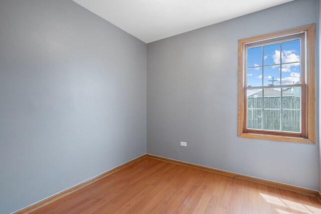 5343 S Long Ave Unit 5, Chicago, IL 60638 - spare room featuring baseboards and light wood finished floors