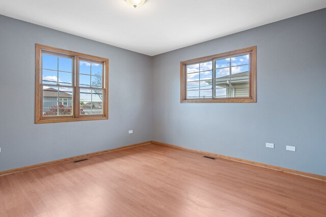 5343 S Long Ave Unit 5, Chicago, IL 60638 - empty room featuring wood finished floors and baseboards