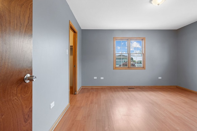 5343 S Long Ave Unit 5, Chicago, IL 60638 - unfurnished bedroom with light wood-style floors and baseboards
