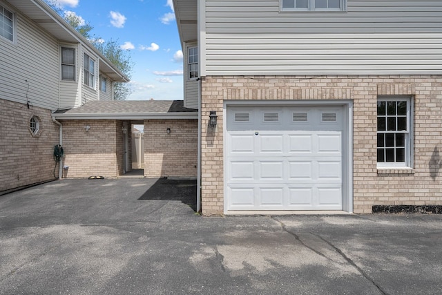 5343 S Long Ave Unit 5, Chicago, IL 60638 - garage featuring asphalt driveway