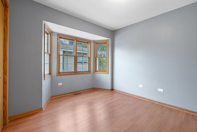 5343 S Long Ave Unit 5, Chicago, IL 60638 - empty room featuring light wood-style flooring and baseboards