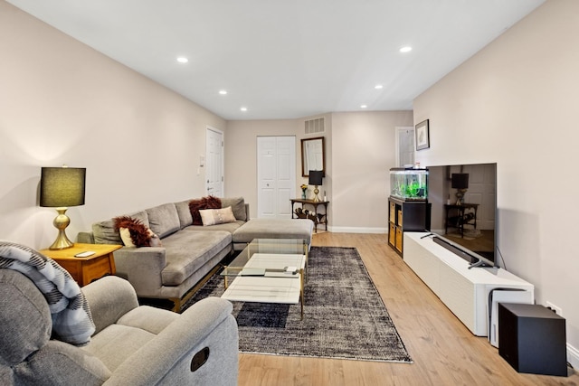 54 Brookston Dr Unit A1, Schaumburg, IL 60193 - living area featuring recessed lighting, baseboards, and light wood-style floors