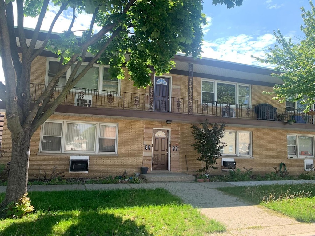 3119 Scoville Ave Unit 7, Berwyn, IL 60402 - view of front of home featuring brick siding and a balcony