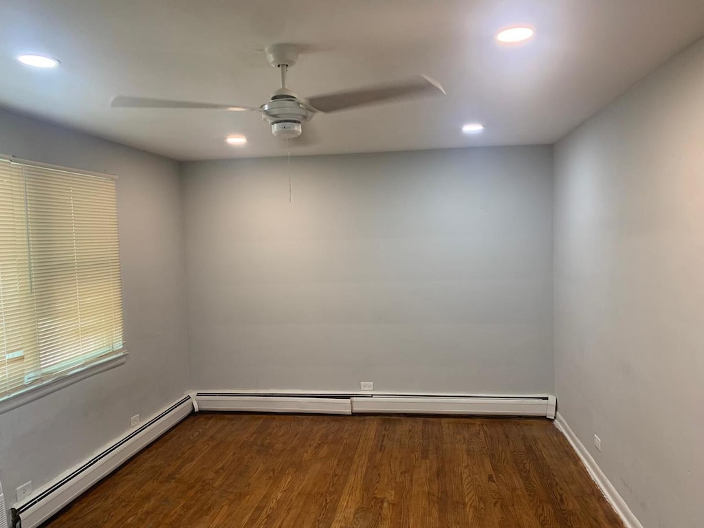 3119 Scoville Ave Unit 7, Berwyn, IL 60402 - unfurnished room featuring recessed lighting, dark wood-type flooring, a ceiling fan, a baseboard heating unit, and baseboards