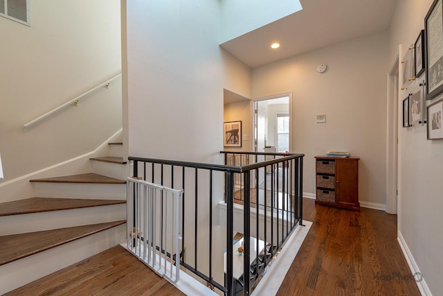 2044 W Roscoe St Unit 2S, Chicago, IL 60618 - stairs with wood finished floors, recessed lighting, and baseboards