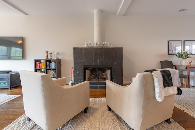 2044 W Roscoe St Unit 2S, Chicago, IL 60618 - living room with wood finished floors and a tile fireplace