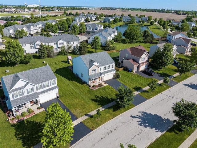 1129 S Wabena Ave, Minooka, IL 60447 - aerial perspective of suburban area with a nearby body of water