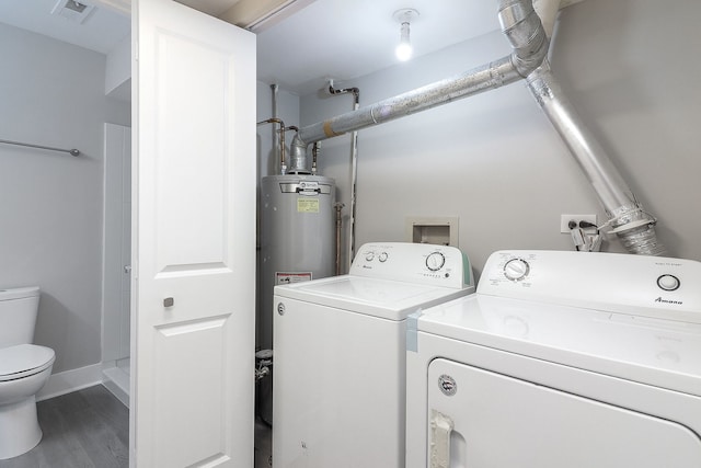1914 Brookside Ln, Hoffman Estates, IL 60169 - washroom featuring washer and dryer, wood finished floors, and baseboards