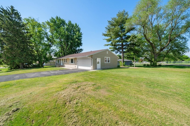 341 Cardinal Ln, Lake Holiday, IL 60552 - view of front of home with asphalt driveway and a front lawn