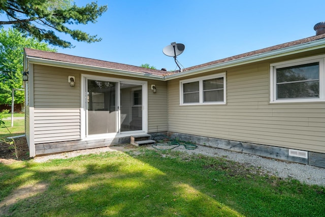 341 Cardinal Ln, Lake Holiday, IL 60552 - rear view of house with a lawn and entry steps