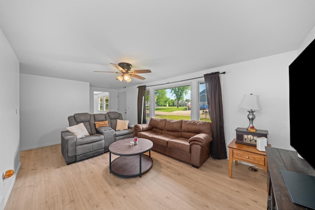 341 Cardinal Ln, Lake Holiday, IL 60552 - living area with light wood-style flooring, a ceiling fan, and baseboards