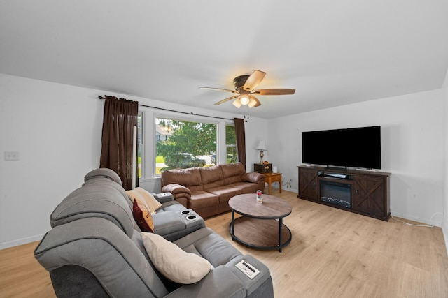 341 Cardinal Ln, Lake Holiday, IL 60552 - living area with ceiling fan, light wood-style flooring, and baseboards