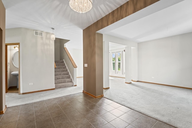 3816 Stockton Dr, Joliet, IL 60436 - carpeted spare room with baseboards, stairs, tile patterned floors, and a chandelier