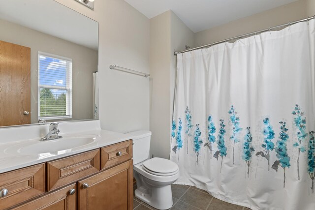 3816 Stockton Dr, Joliet, IL 60436 - bathroom featuring tile patterned floors, toilet, vanity, and a shower with curtain