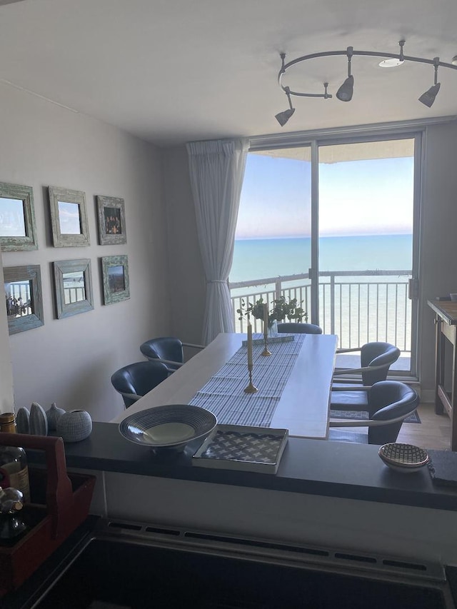 6007 N Sheridan Rd Unit 31A, Chicago, IL 60660 - dining space featuring a desk and a water view