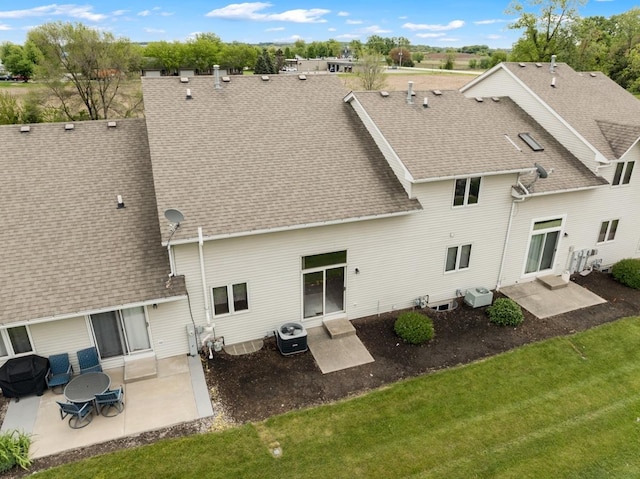 816 Adam Ln, Hampshire, IL 60140 - rear view of house with a patio area, a shingled roof, a yard, and central AC unit