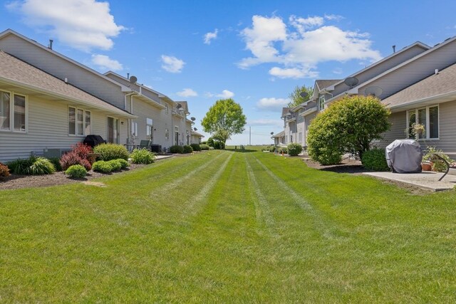 816 Adam Ln, Hampshire, IL 60140 - view of green lawn with a residential view