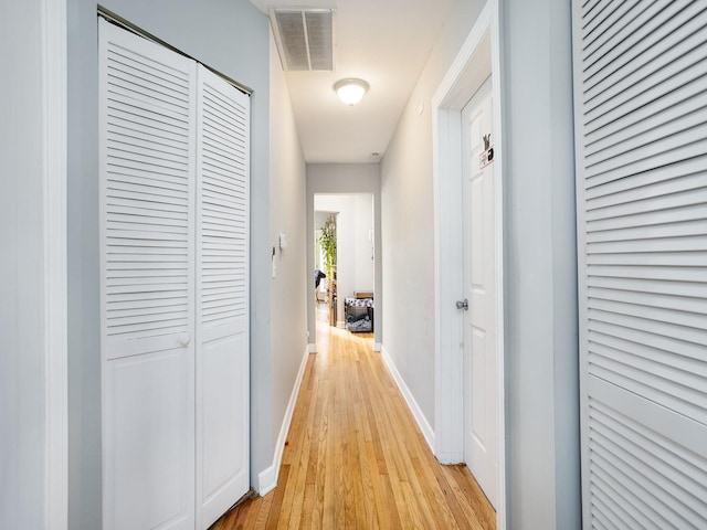 6111 S Eberhart Ave, Chicago, IL 60637 - corridor featuring light wood-style flooring and baseboards