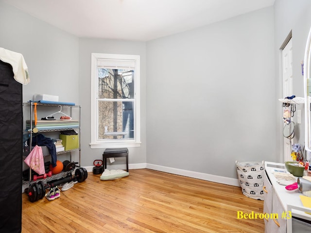 6111 S Eberhart Ave, Chicago, IL 60637 - game room with wood finished floors and baseboards