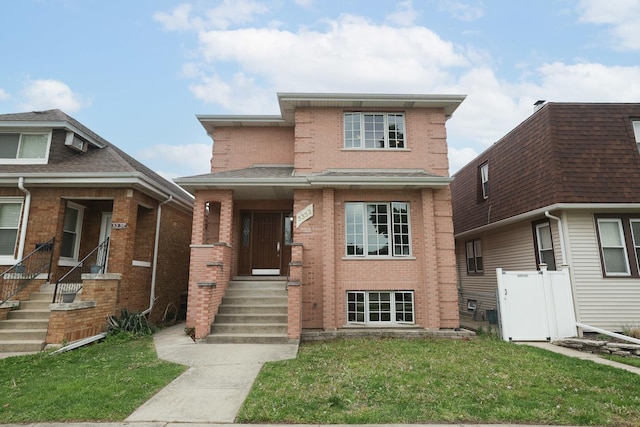 5352 N Neva Ave, Chicago, IL 60656 - view of front of house with brick siding and a front lawn