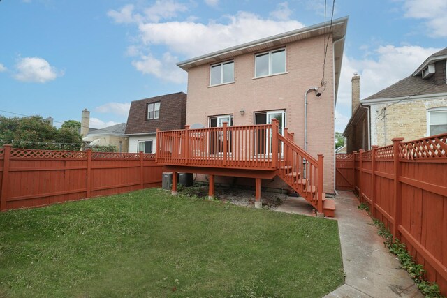 5352 N Neva Ave, Chicago, IL 60656 - rear view of house featuring a deck, brick siding, and stairs