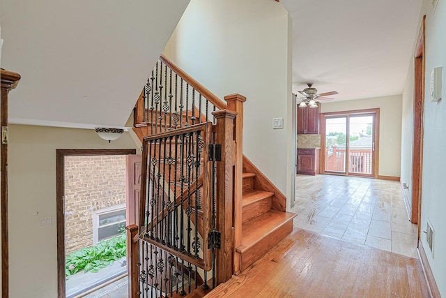5352 N Neva Ave, Chicago, IL 60656 - stairway featuring ceiling fan and baseboards