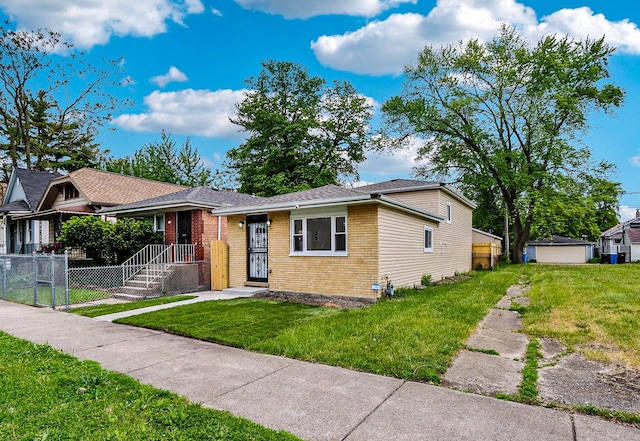 337 W 106th Pl, Chicago, IL 60628 - view of front of home featuring brick siding and a detached garage