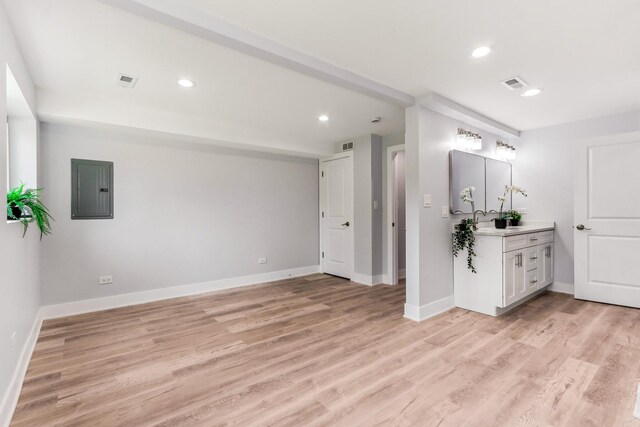 337 W 106th Pl, Chicago, IL 60628 - bathroom featuring electric panel, wood finished floors, baseboards, and recessed lighting
