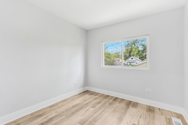 337 W 106th Pl, Chicago, IL 60628 - spare room featuring light wood-type flooring and baseboards