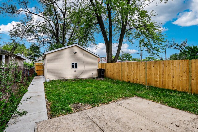 337 W 106th Pl, Chicago, IL 60628 - view of home's exterior with a patio area