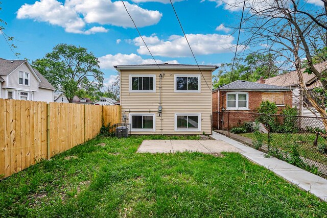 337 W 106th Pl, Chicago, IL 60628 - rear view of property with a patio and central AC unit
