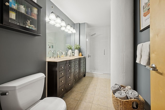 1224 W Van Buren Ave Unit 416, Chicago, IL 60607 - full bathroom with a shower stall, toilet, tile patterned flooring, and double vanity