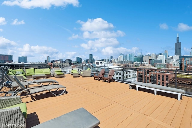 1224 W Van Buren Ave Unit 416, Chicago, IL 60607 - wooden deck featuring a view of skyline