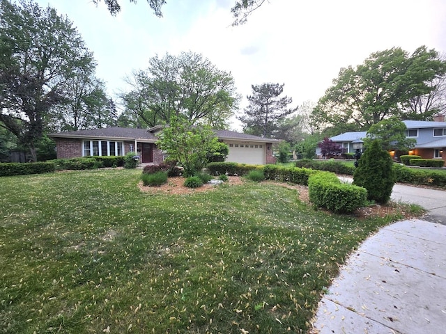 7930 Grant St, Darien, IL 60561 - view of front facade with a garage, brick siding, and a front yard