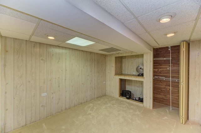7930 Grant St, Darien, IL 60561 - finished basement featuring a paneled ceiling, wood walls, and carpet