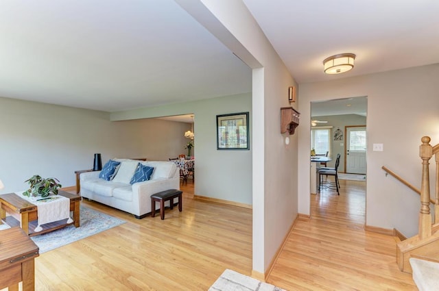 7930 Grant St, Darien, IL 60561 - living room featuring light wood finished floors and baseboards